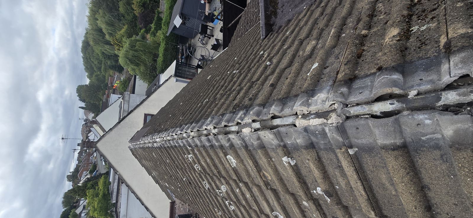 Ridge line with ridge tiles missing, found during a roof inspection