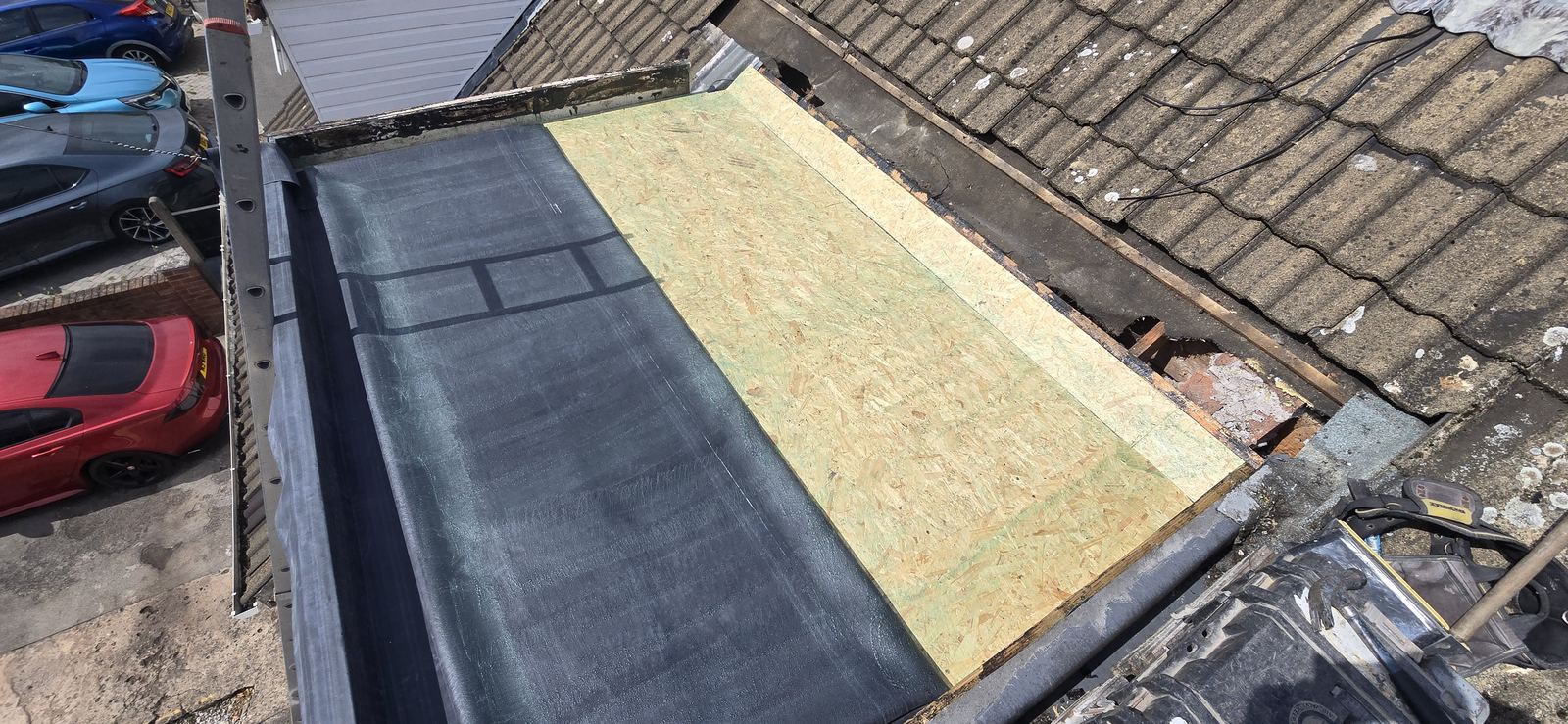 Flat roof deck being prepared for a new covering