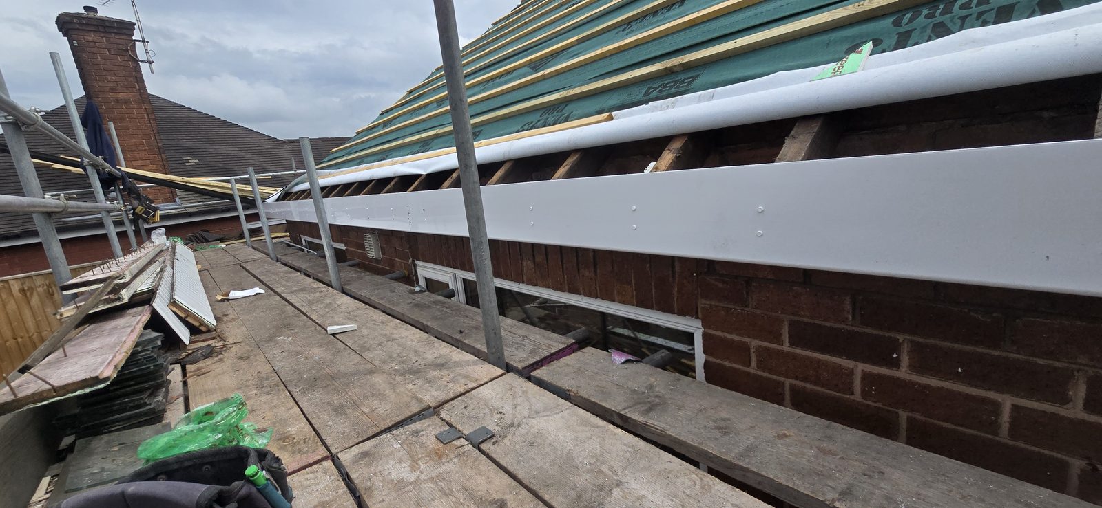 New white UPVC fascia boards fitted along the eaves of the Hawarden bungalow