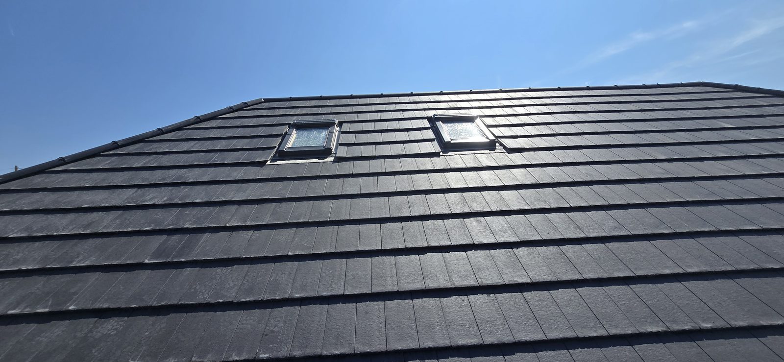 Two new roof windows set into the main roof in Marley Duo Edgemere tiles