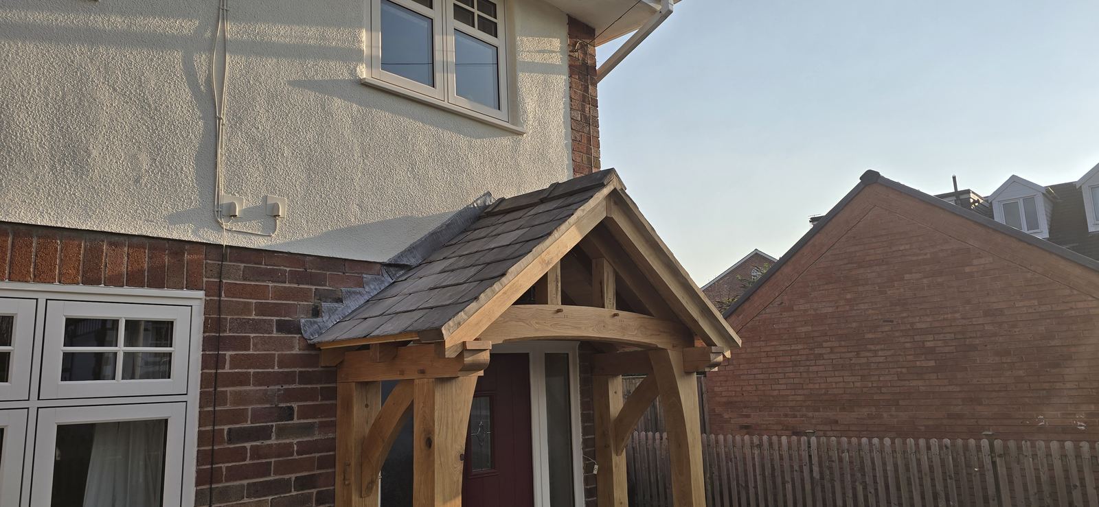 Bespoke oak-framed porch canopy with a slate roof